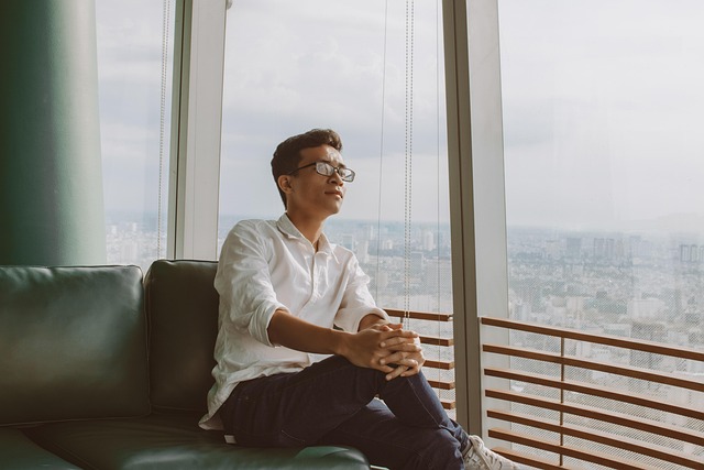 battery system technician checking inverter settings on a tablet during commissioning